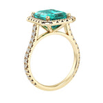 Sparkling Paraiba Tourmaline Emerald Cut center with French Pave Diamond Halo crafted in 14K Yellow Gold halo ring Pel and Co vivid ocean glow style 