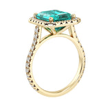 Sparkling Paraiba Tourmaline Emerald Cut center with French Pave Diamond Halo crafted in 14K Yellow Gold halo ring Pel and Co vivid ocean glow style 