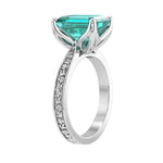 Emerald Cut Paraiba Tourmaline Antique Style Ring engraved 14K Gold glowing blue green gemstone Pel and Co