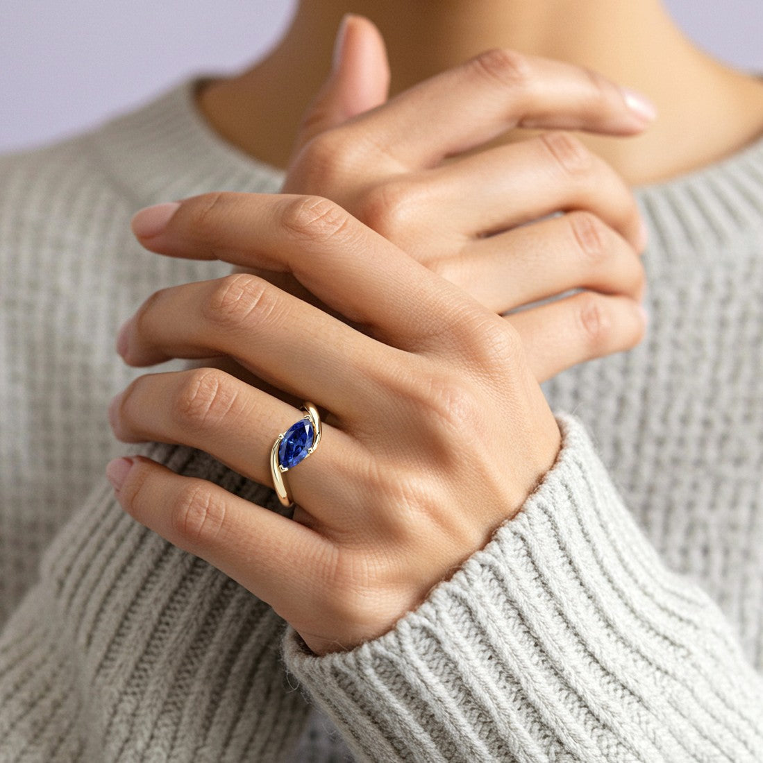 Blue Sapphire Bypass Ring marquise center stone 14K Gold contemporary fine jewelry Pel and Co