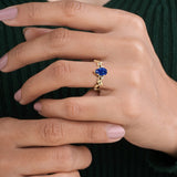 Nature Inspired Blue Sapphire Ring pear cut center stone 14K Gold unique fine jewelry Pel and Co