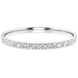 White gold ring with small diamonds on a white background