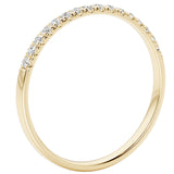 Gold ring with small diamonds on a white background
