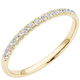 Gold ring with small diamonds on a white background