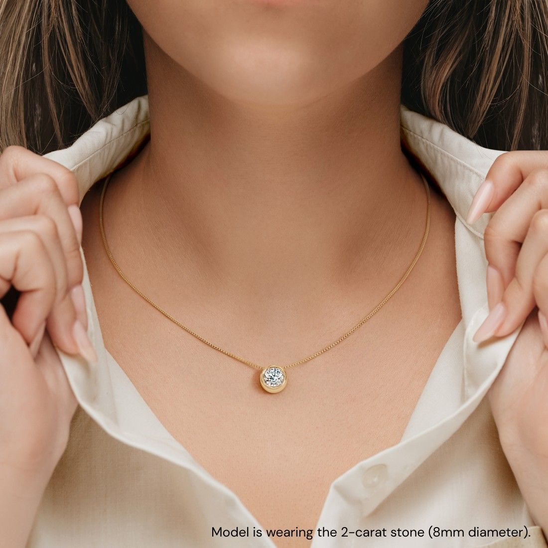solitaire diamond bezel necklace in 14k gold