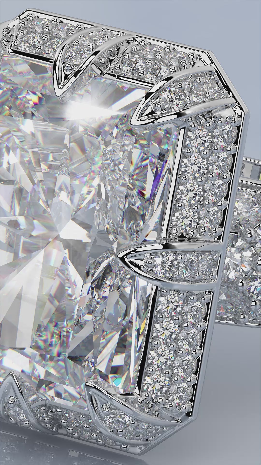 Personalized custom jewelry ring from Pel & Co featuring a stunning radiant cut diamond center.